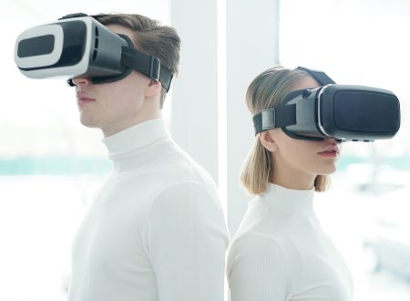 Young people in virtual reality goggles